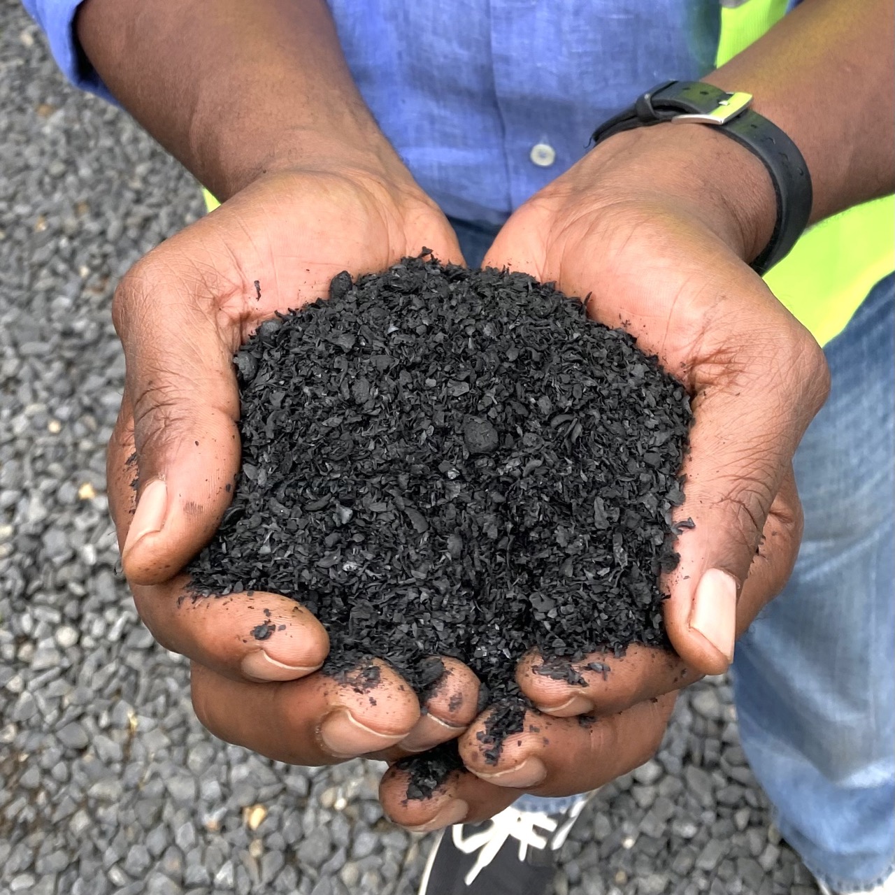 Some biochar in a hand.