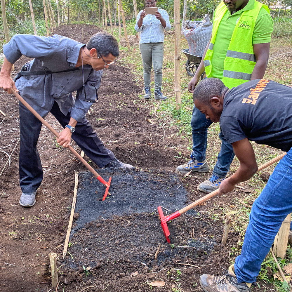 Soil being amended with biochar in Cameroon.